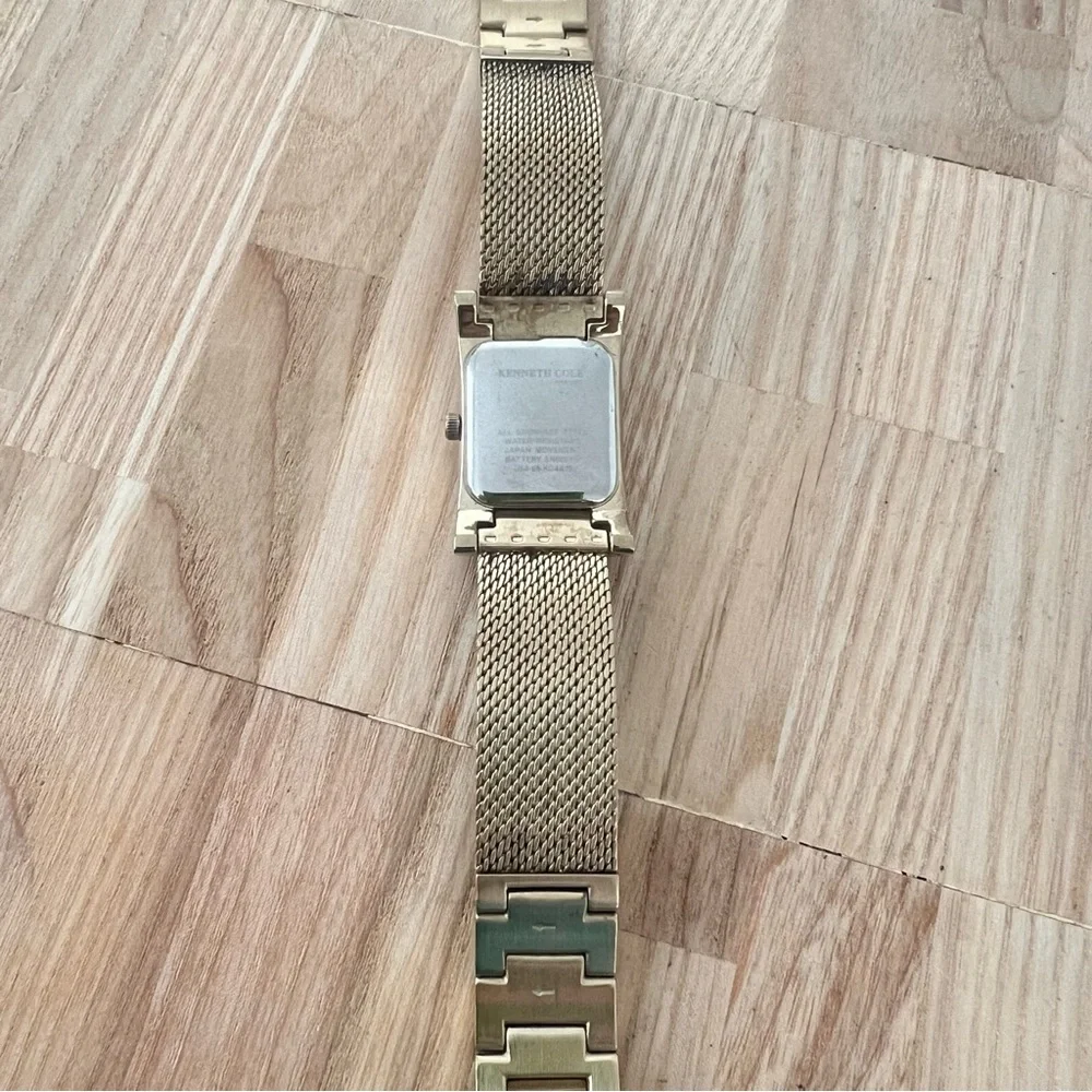 Kenneth Cole New York ladies rectangular gold tone dress watch NEW BATTERY